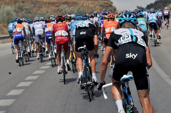 The peloton tackles a climb during stage four.