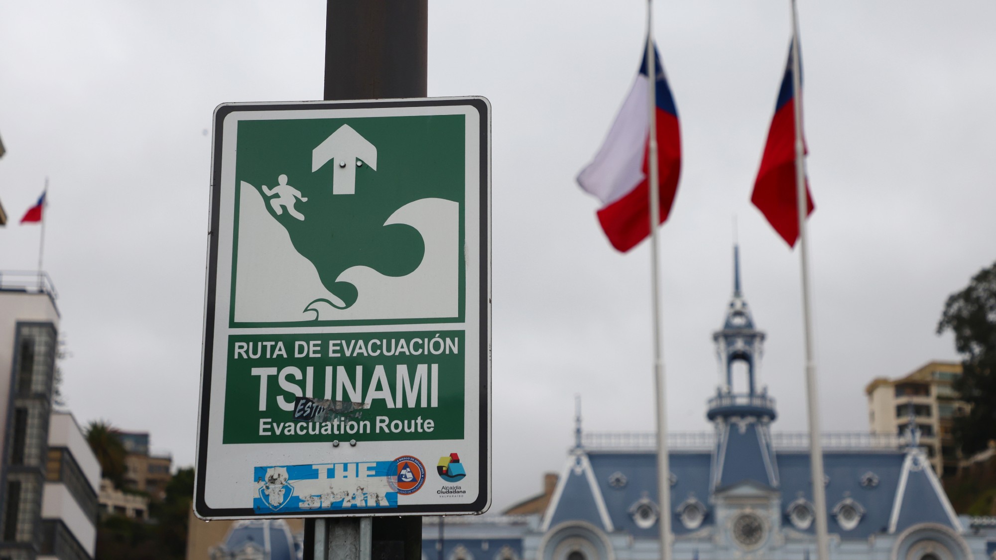 A sign indicating the safe zone in Valparaiso, Chile