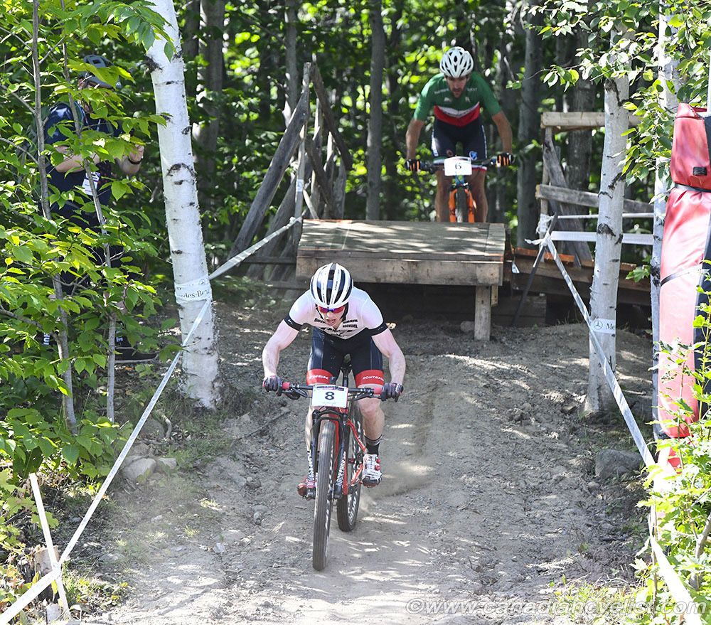Anton Cooper (NZl) Trek Factory Racing XC being chased by Gerhard Kerschbaumer (Ita) Torpado Gabogas