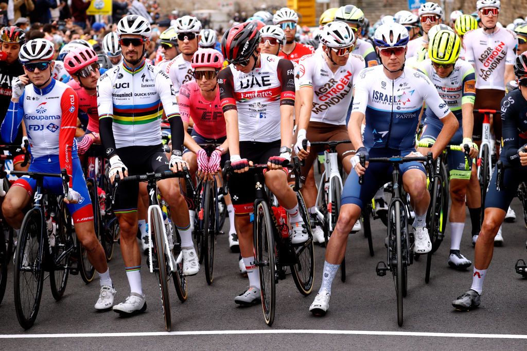 LANDERNEAU FRANCE JUNE 26 David Gaudu of France and Team Groupama FDJ Julian Alaphilippe of France and Team Deceuninck QuickStep Neilson Powless of The United States and Team EF Education Nippo Tadej Pogaar of Slovenia and UAETeam Emirates Chris Froome of The United Kingdom and Team Israel StartUp Nation at start during the 108th Tour de France 2021 Stage 1 a 1978km stage from Brest to Landerneau Cte De La Fosse Aux Loups 176m Team Presentation LeTour TDF2021 on June 26 2021 in Landerneau France Photo by Chris GraythenGetty Images