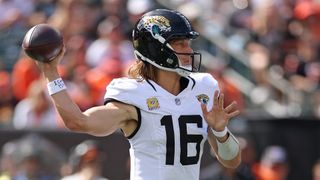 Trevor Lawrence #16 of the Jacksonville Jaguars makes a pass during a 2026 NFL game.