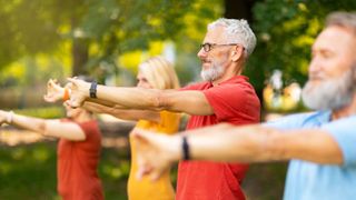 a photo of a senior man stretching