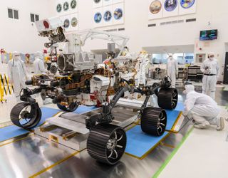 NASA's Mars 2020 rover takes its first test drive in the clean room of the Jet Propulsion Laboratory in Pasadena, California on Dec. 17, 2019.