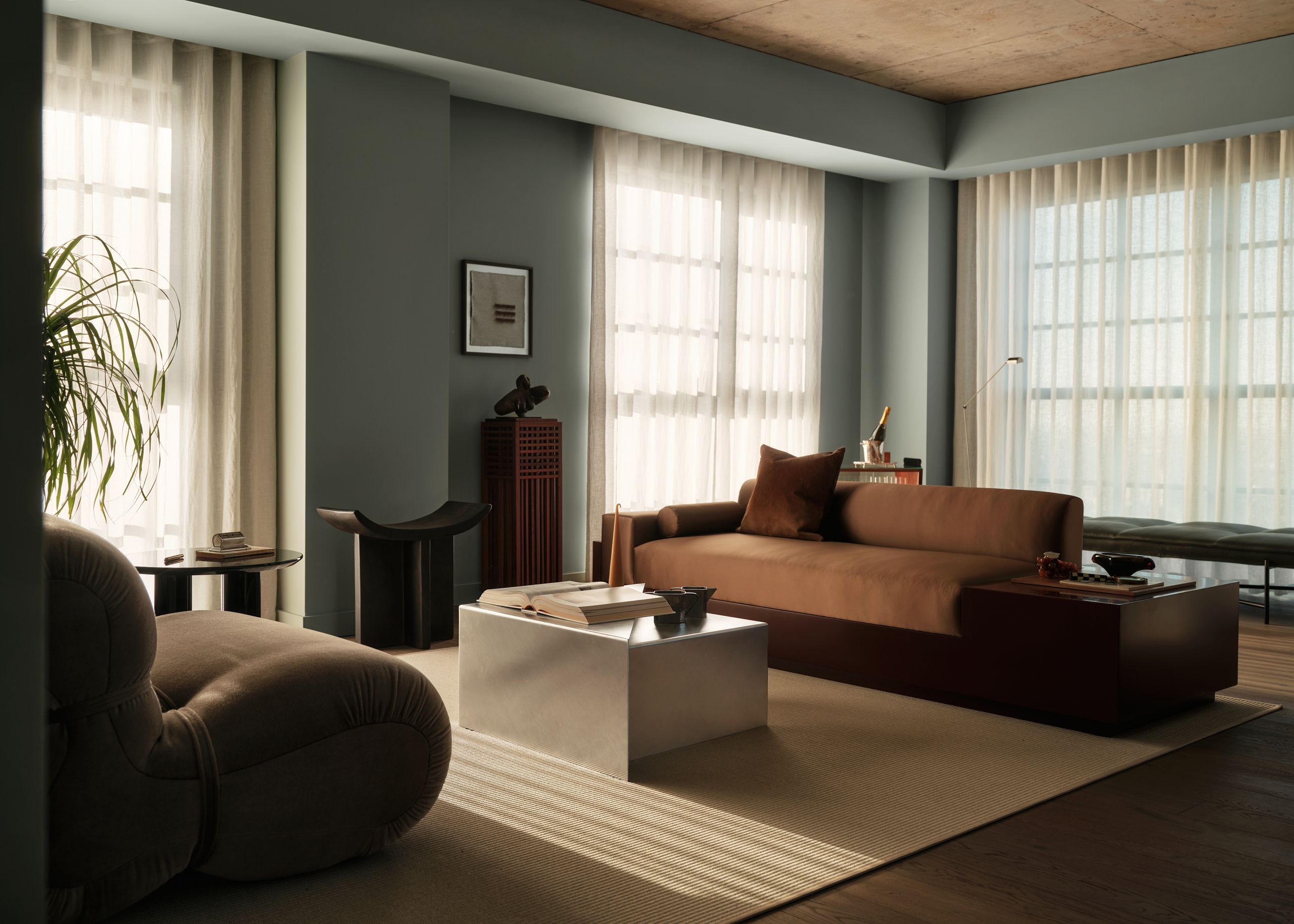 This Canada Water penthouse’s natural warmth belies its industrial setting