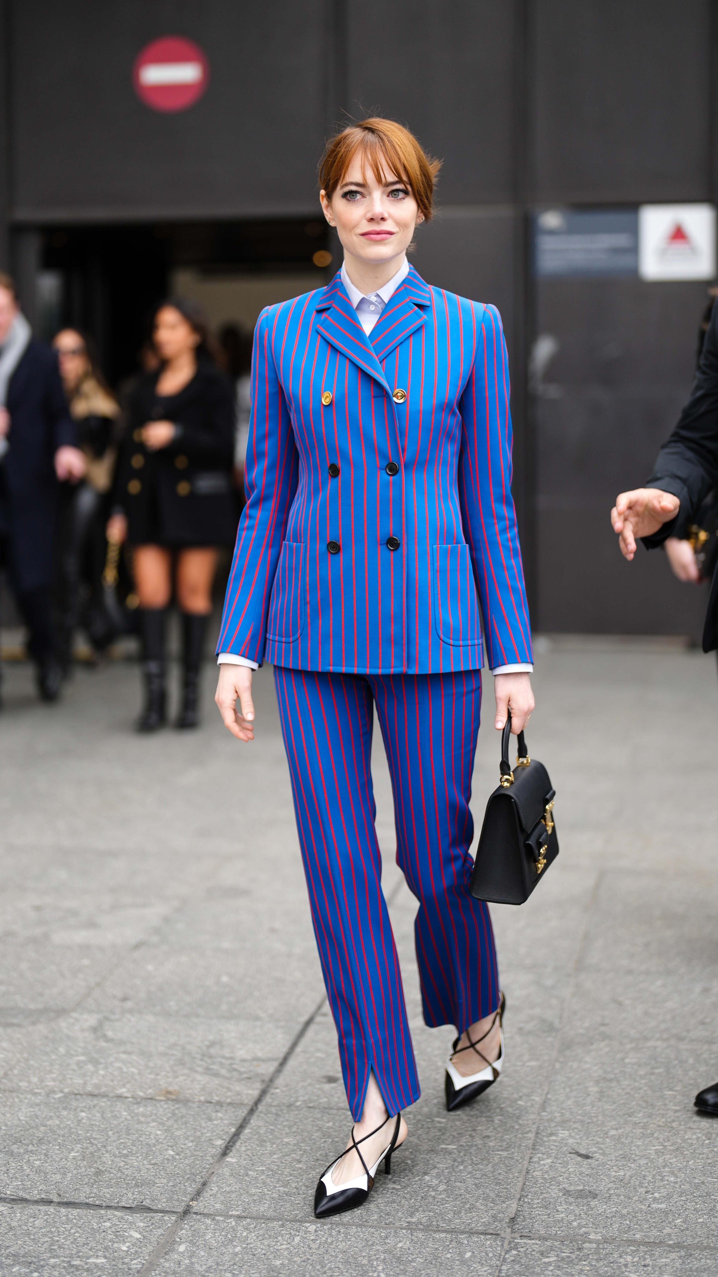 Emma Stone outside Louis Vuitton, during Paris Fashion Week - Womenswear Fall Winter 2023 2024, on March 06, 2023 in Paris, France.