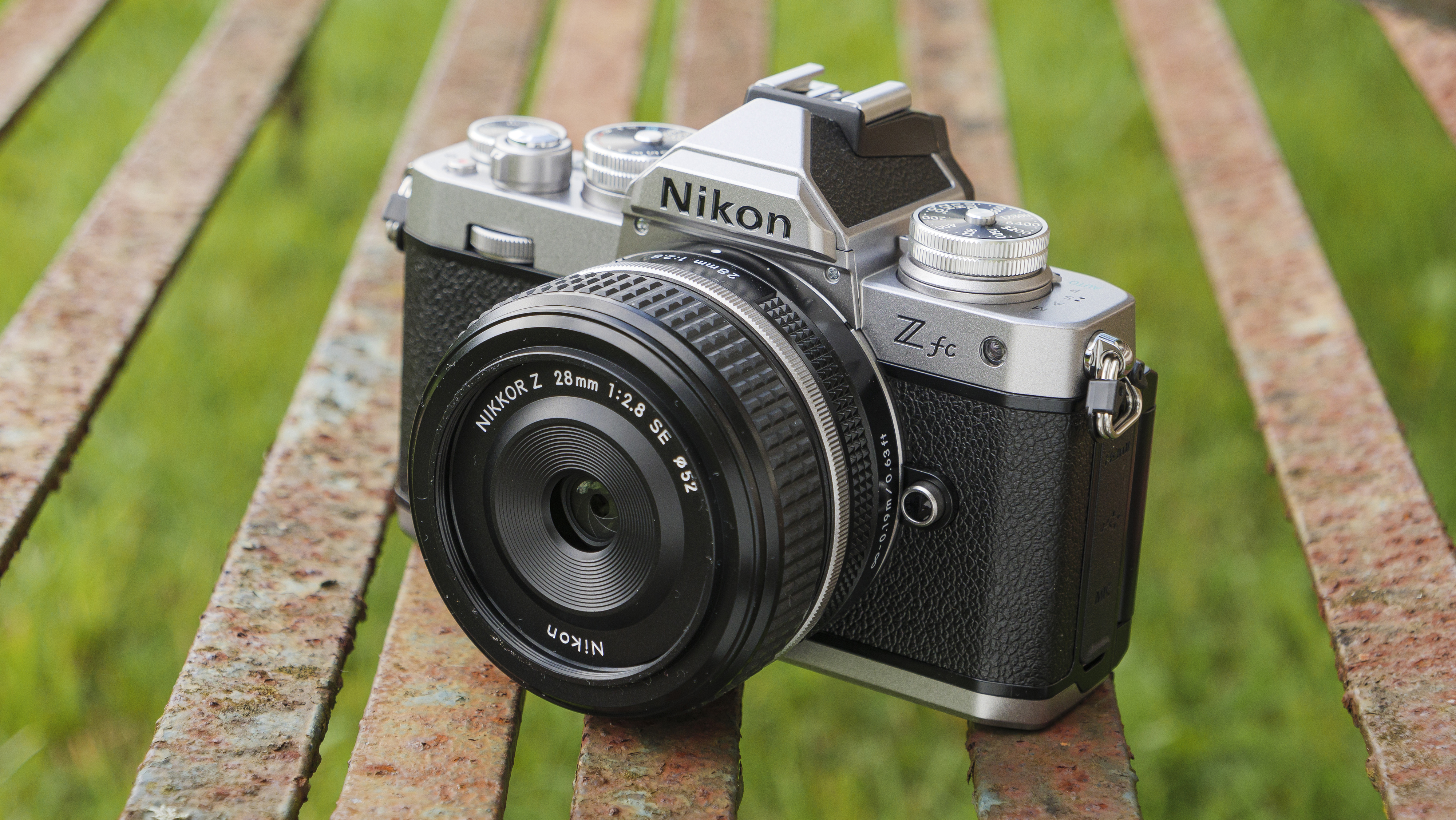 The Nikon Z fc camera on a park bench