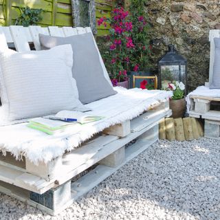 Recycled wood garden seating, pale grey cushions