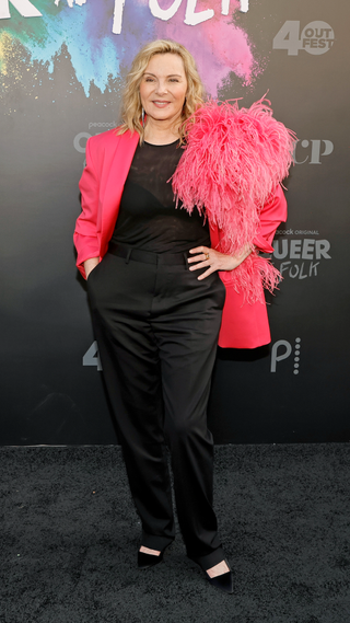 Kim Cattrall attends Peacock's "Queer As Folk" World Premiere Event, in partnership with Outfest's OutFronts Festival, at The Theatre at Ace Hotel on June 03, 2022 in Los Angeles, California