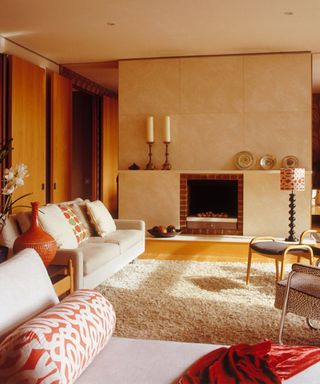 neutral living room with a cream tiled chimney breast