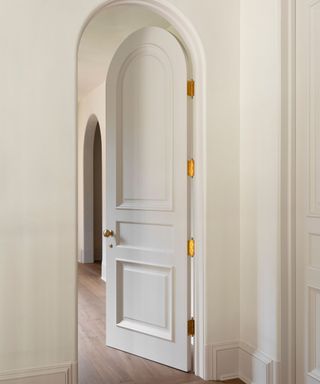 Beige entryway painted in Drift of Mist by Sherwin-Williams