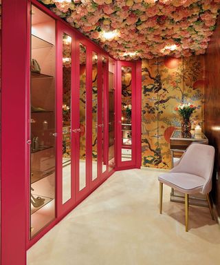 Bedroom with pink mirrored wardrobes