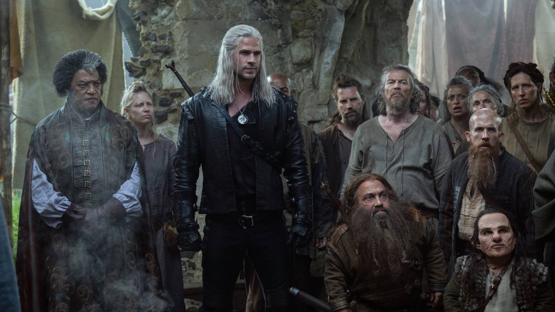 Laurence Fishburne as Regis and Liam Hemsworth as Geralt in The Witcher season 4