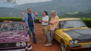 Jeremy Clarkson, Richard Hammond and James May share a joke in The Grand Tour: One for the Road