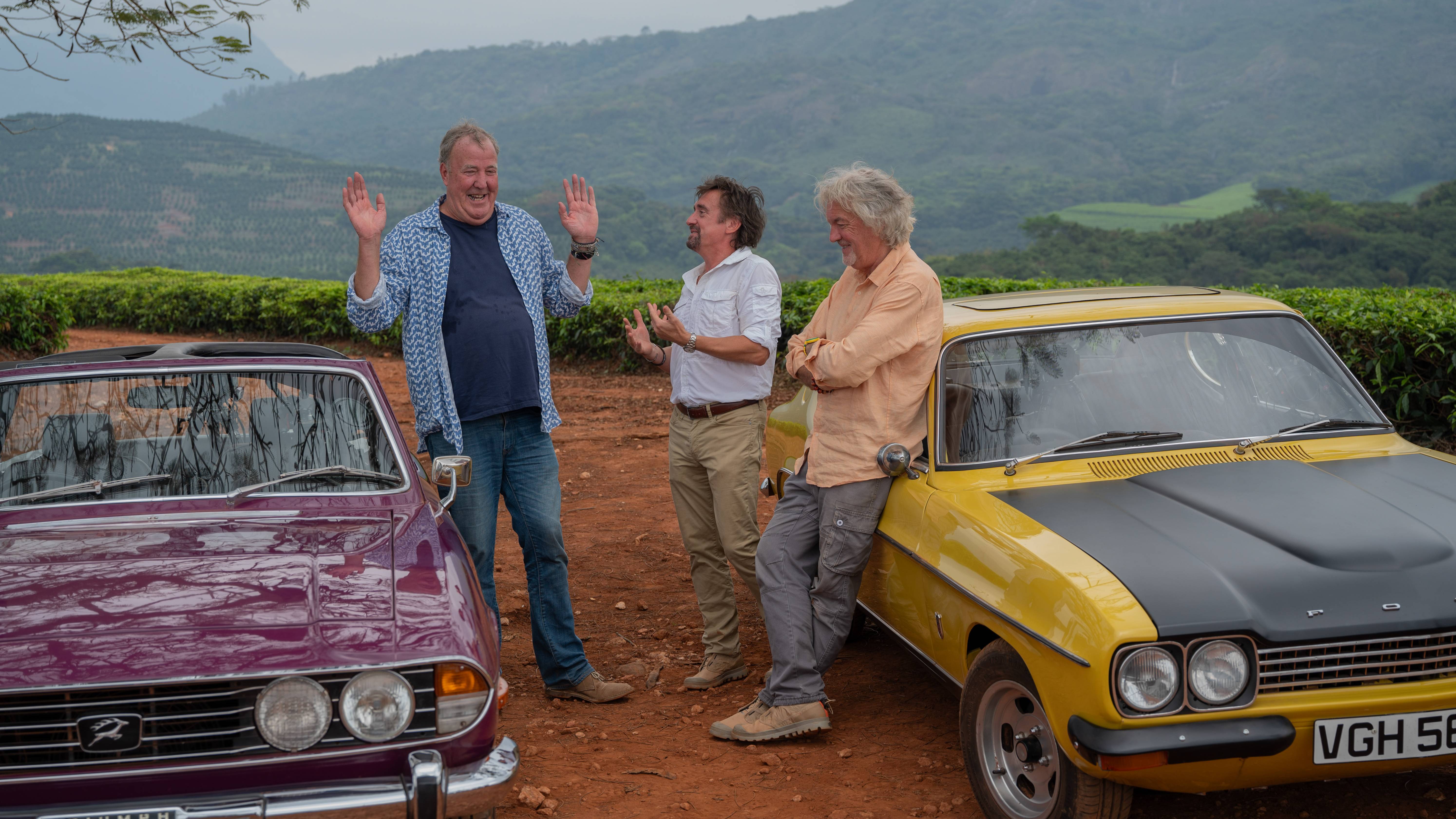 Jeremy Clarkson, Richard Hammond and James May share a joke in The Grand Tour: One for the Road