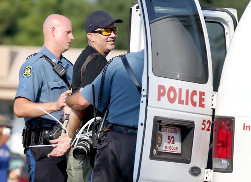 Police in Ferguson arrest Getty Images photographer