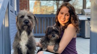 It's all smiles today for Laura and her two adorable dogs, Azula and Evie