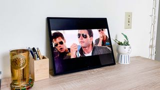 Asus Zenbook 17 Fold OLED review unit propped up playing Top Gun