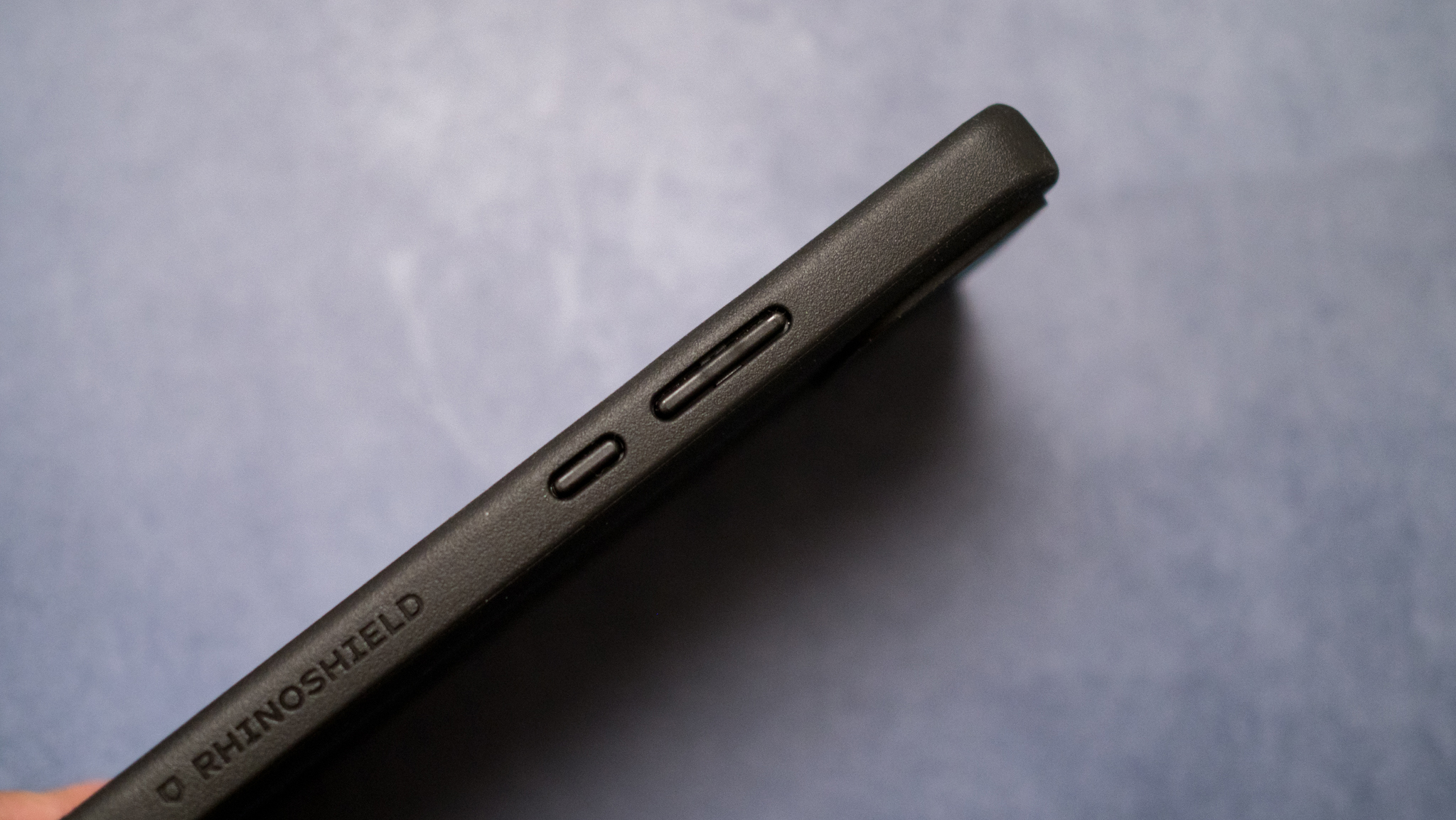 ASUS Zenfone 12 Ultra buttons with device in a case