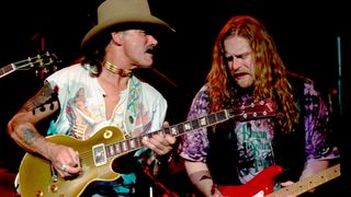 Dickey Betts (left) and Warren Haynes perform with the Allman Brothers Band at Lakewood Amphitheater in Atlanta, Georgia Circa 1993