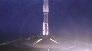 SpaceX's Falcon 9 rocket designated B1049 stands on the drone ship "Of Course I Still Love You" after successfully completing its eighth launch and landing with the Starlink 17 mission, on March 4, 2021.