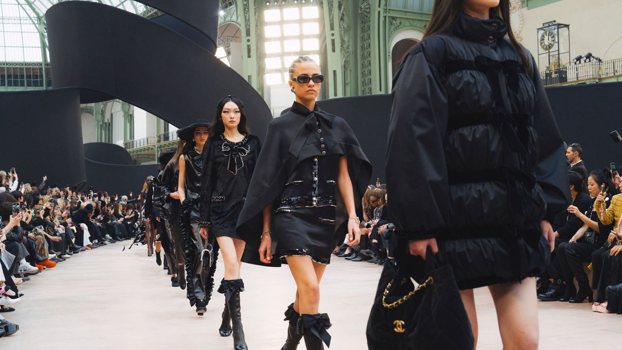 Chanel AW25 models in all-black outfits