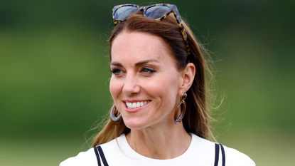Kate Middleton has down-to-earth mum moment, seen here attending the Out-Sourcing Inc. Royal Charity Polo Cup at Guards Polo Club, Flemish Farm on July 6, 2022 in Windsor, England.