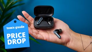 EarFun Air Pro 4 in hand with a Tom's Guide deal tag on the left of the image