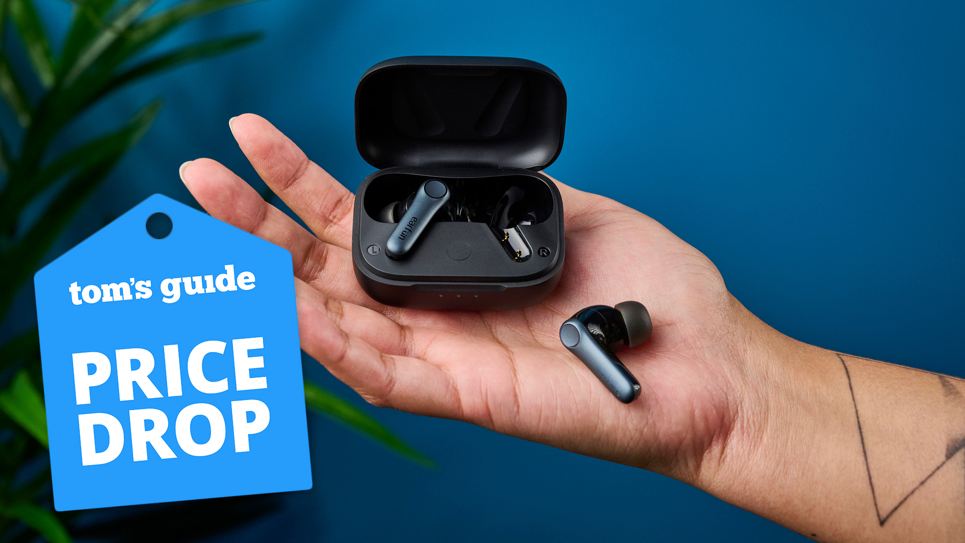 EarFun Air Pro 4 in hand with a Tom&#039;s Guide deal tag on the left of the image
