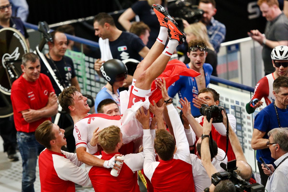 The Polish squad celebrate Szymon Sajnok's omnium world title