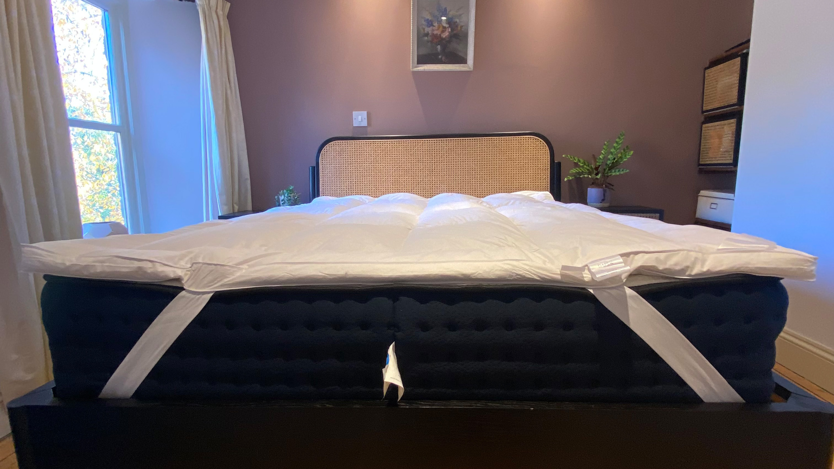 DUSK Luxury Duck Feather &amp; Down Mattress Topper being reviewed on a bed