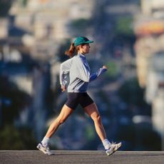 A woman doing one of the best ten minute walking workouts