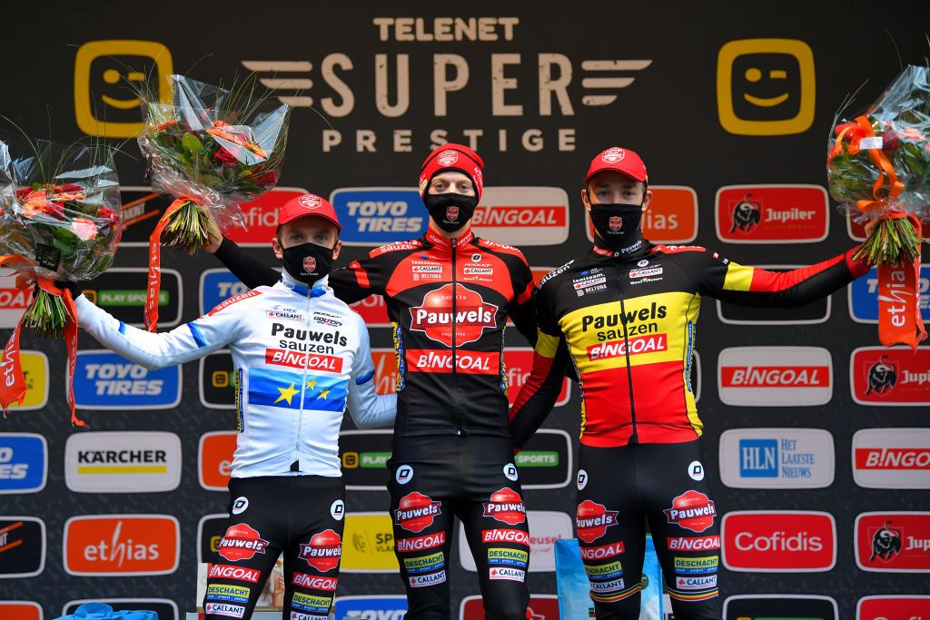 Eli Iserbyt, Michael Vanthourenhout and Laurens Sweeck celebrate a Pauwels Sauzen-Bingoa sweep of the podium in Merksplas