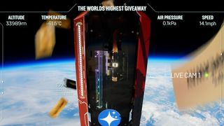 A gaming PC hovers in space, surrounded by falling golden tickets.