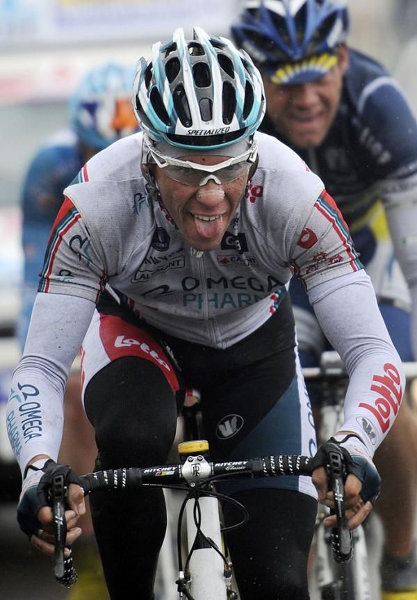 Philippe Gilbert (Omega Pharma-Lotto) gets a taste of the Belgian rain.