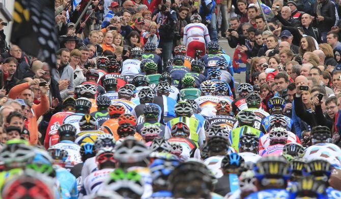 The peloton squeeze through the crowds at Li&egrave;ge-Bastogne-Li&egrave;ge