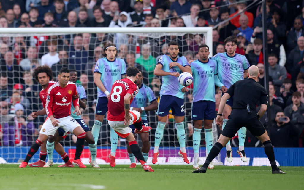 MANCHESTER, ENGLAND - MARCH 9: Bruno Fernandes of Manchester United scores 1st goal during the Premier League match between Manchester United FC and Arsenal FC at Old Trafford on March 9, 2025 in Manchester, England. (Photo by Ed Sykes/Sportsphoto/Allstar via Getty Images)