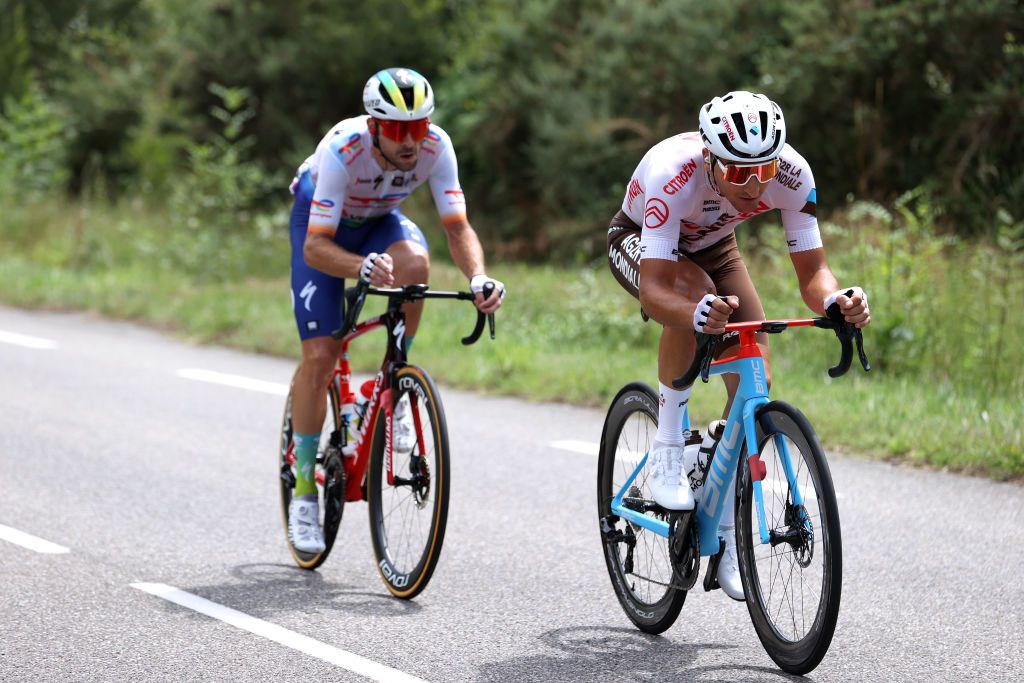 BORDEAUX FRANCE JULY 07 LR Pierre Latour of France and Team TotalEnergies and Nans Peters of France and Ag2R Citron Team compete in the breakaway during the stage seven of the 110th Tour de France 2023 a 1699km stage from Mont de Marsan to Bordeaux UCIWT on July 07 2023 in Bordeaux France Photo by Michael SteeleGetty Images