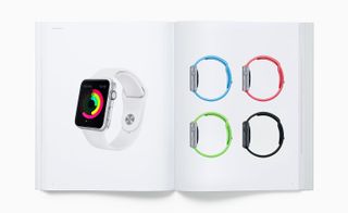 View of two pages inside the 'Designed by Apple in California' book featuring photos of the 2015 Apple Watch Sport with straps in different colours