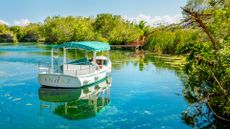 Boat on lagoon at Andaz Mayakoba Resort Riviera Maya