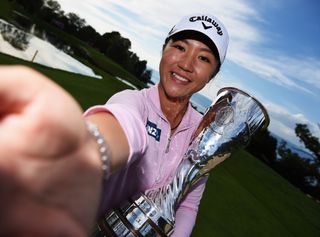 Lydia Ko taking a selfie with the Evian Championship trophy in 2015