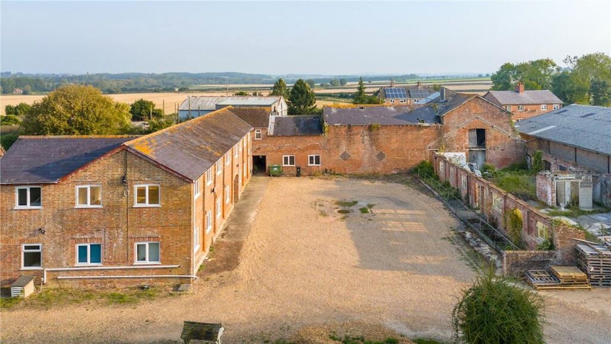 A conversion plot with red brick buildings on it