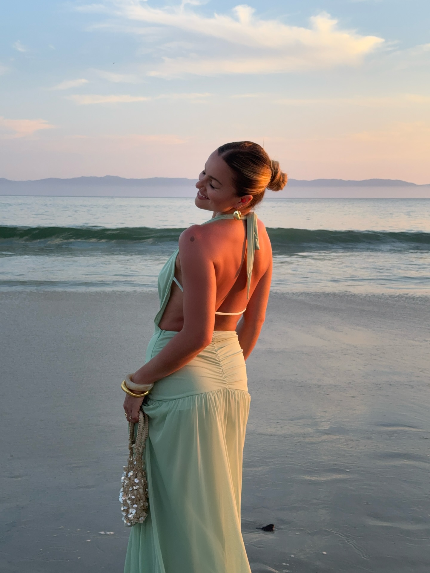 An image of a woman wearing best backless dress summer 2026