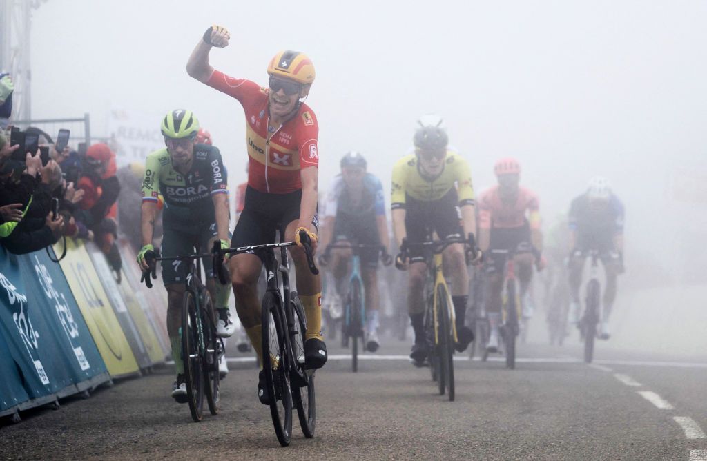 Magnus Cort (Uno-X Mobility) emerges from the mist to win