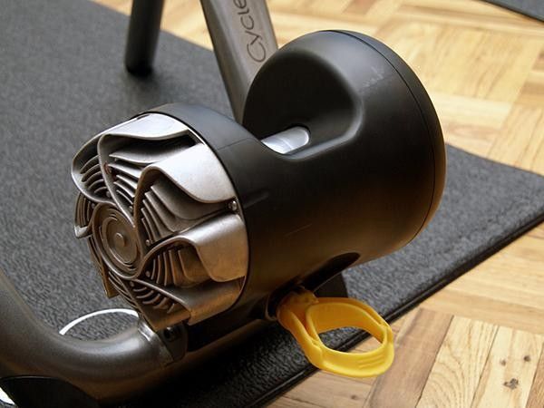 The plastic shroud isn't just for show; it funnels cooling air from the bladed flywheel directly on to the finned fluid housing.