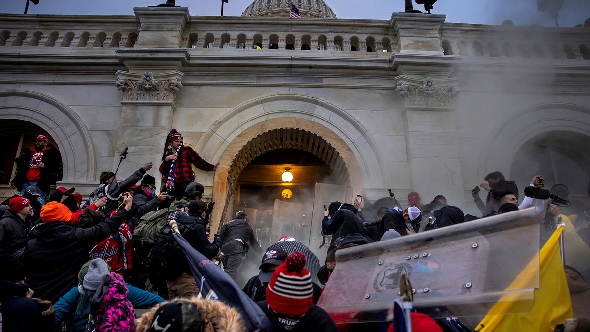 Donald Trump supporters clash with police and security forces as people try to storm the U.S. Capitol on January 6, 2021 in Washington, DC.