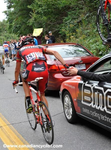 Alessandro Ballan (BMC Racing Team) takes a feed.