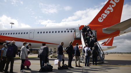 Passengers boarding a plane