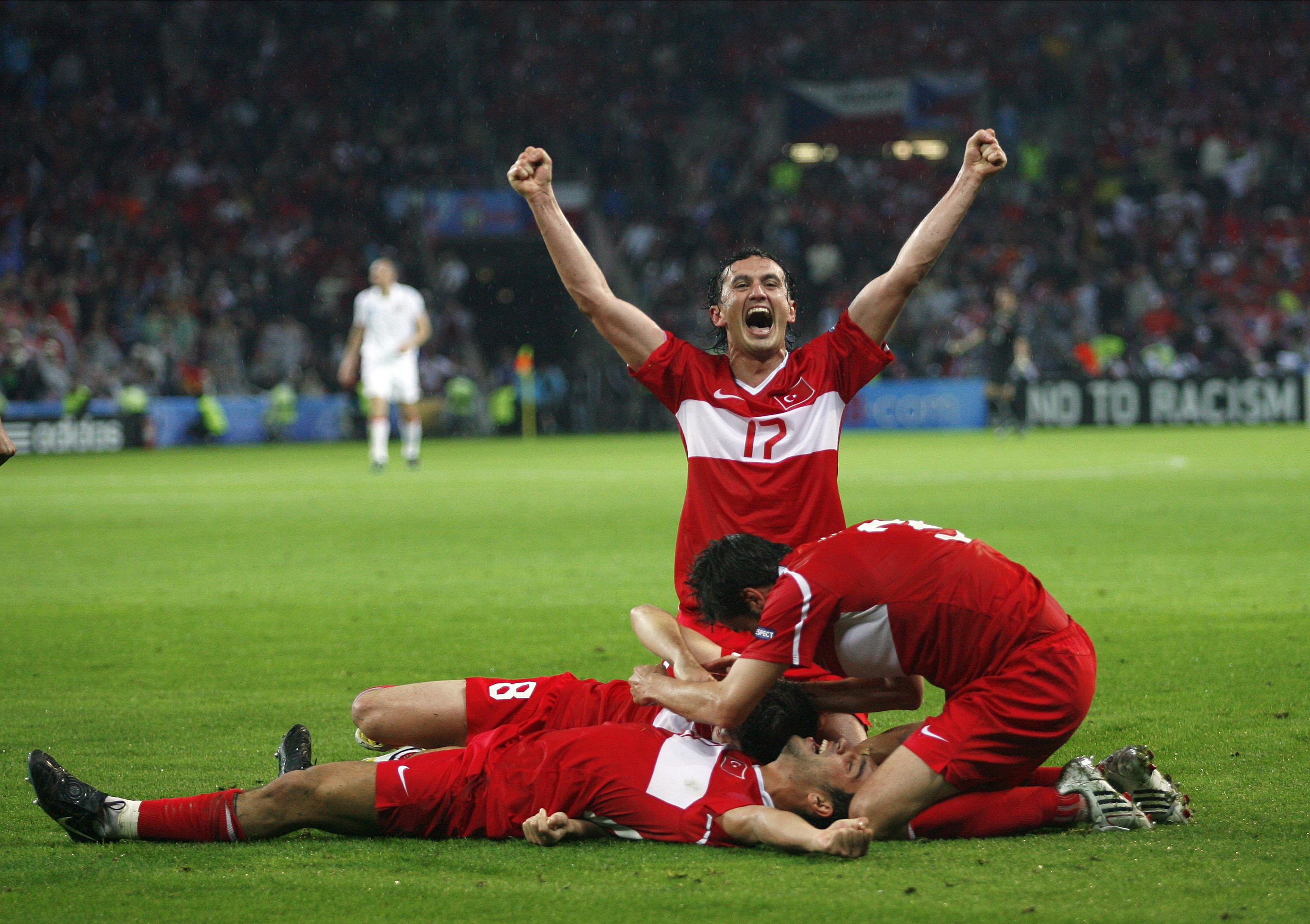 Turkey players celebrate their dramatic comeback win against Czech Republic at Euro 2008.