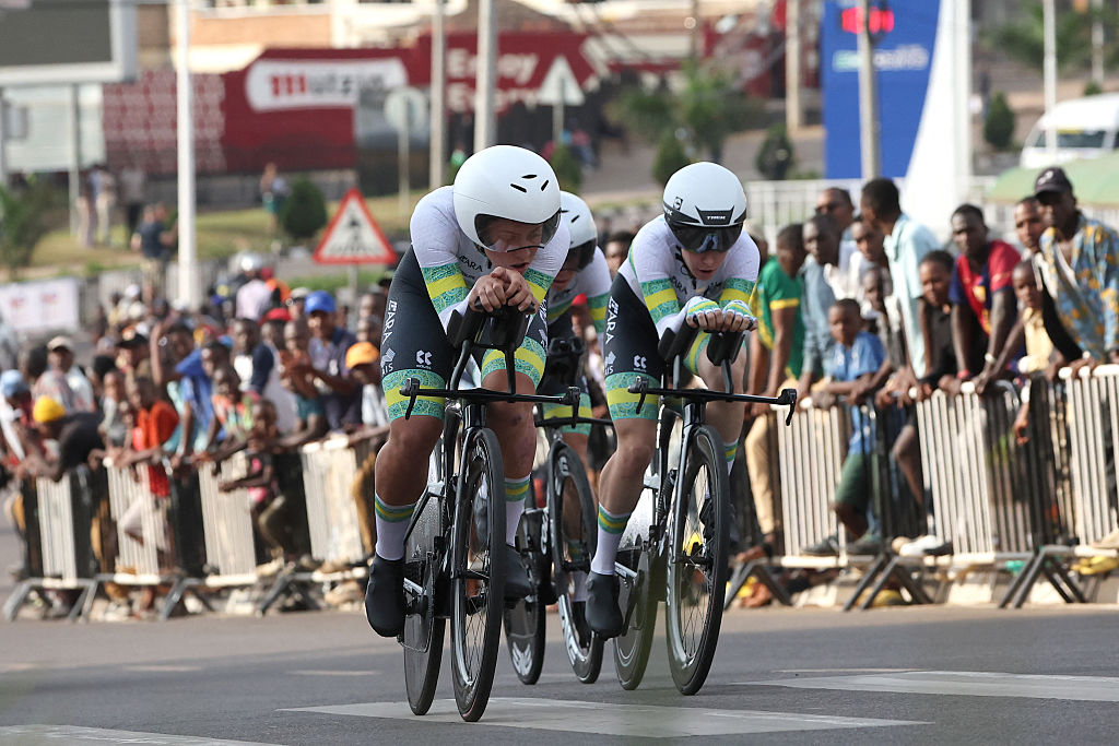 Australian rider Brodie Chapman, Australian rider Amanda Spratt and Australian rider Felicity Wilson-Haffenden compete the team time trial mixed relay cycling event during the UCI 2025 Road World Championships, in Kigali, on September 24, 2025. (Photo by Anne-Christine POUJOULAT / AFP)