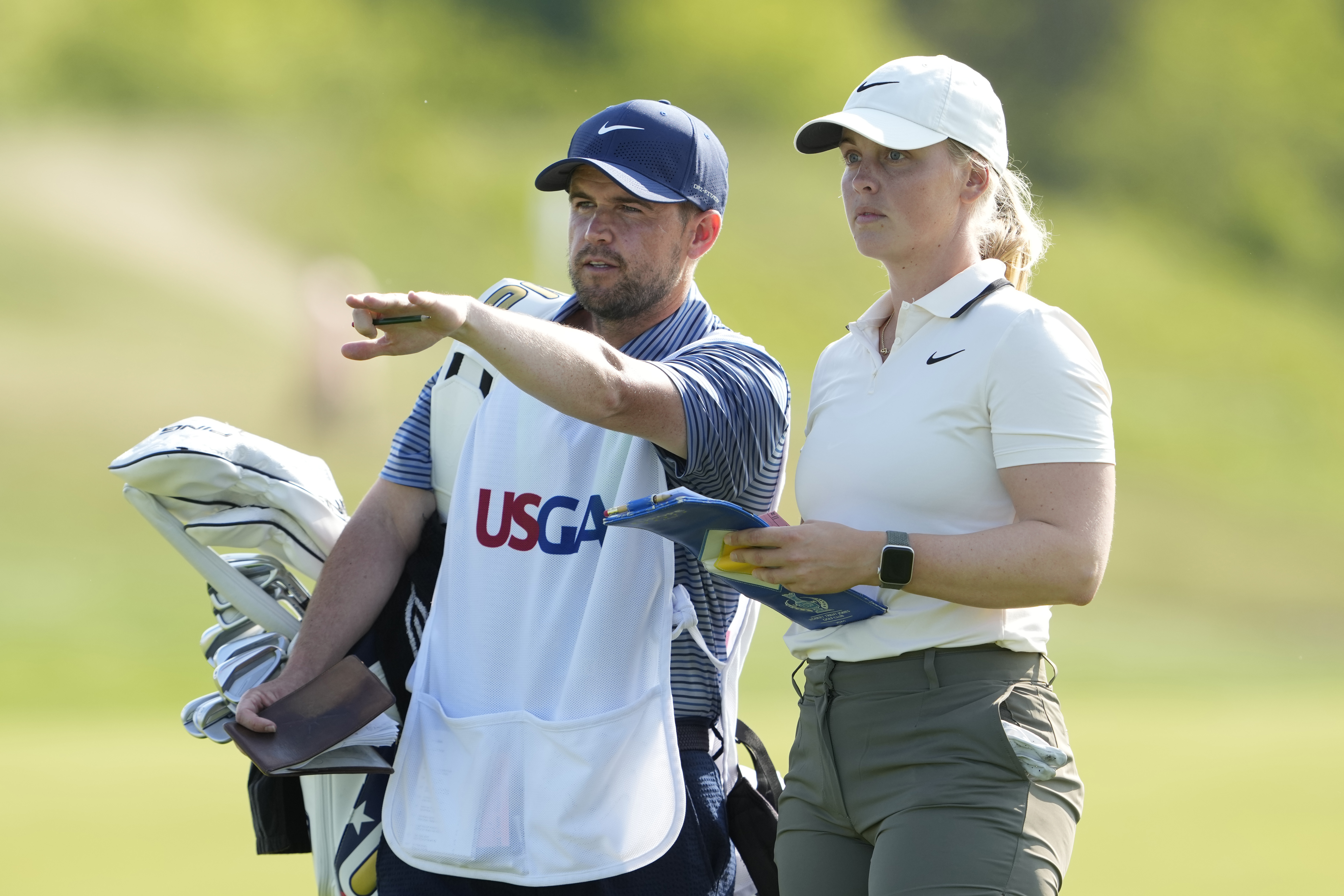 Maja Stark talks to her caddie